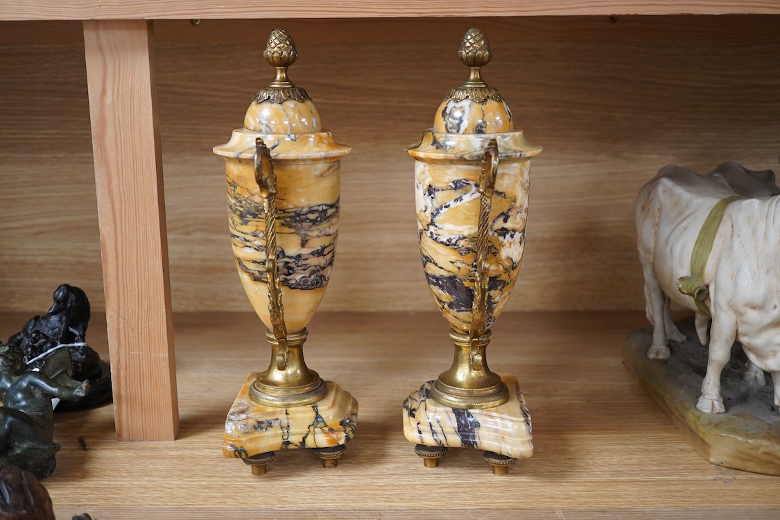 A pair of late 19th century French Sienna marble and ormolu mounted urns, 31cm high.